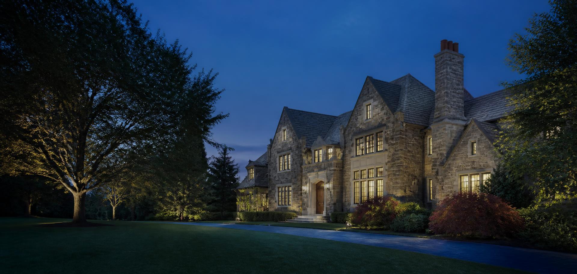 Stone Northeast residence at dusk